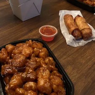 Orange chicken &amp; egg rolls