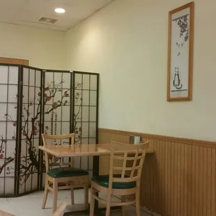 a table and chairs in a restaurant