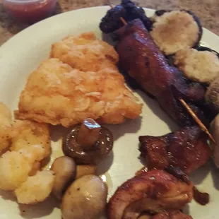 Stuff mushroom, fried fish, fried shrimp, sauteed mushrooms...yummy and the best of all the food I got was the chicken on the stick