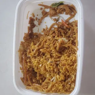 a meal in a styrofoam container