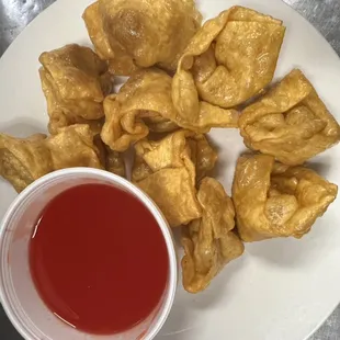 Fried meat wonton with sweet &amp;sour sauce. Crispy wrapped and juicy inside