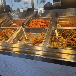 Spicy orange chicken, original orange chicken, mushroom chicken, vegetable chop suey.