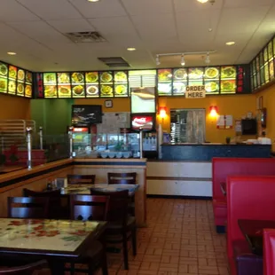 A ten table restaurant in a strip-mall.