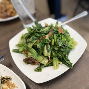 A Choy or stir fry chinese leaf lettuce with fried fish with salted black beans