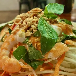 a salad with shrimp and vegetables