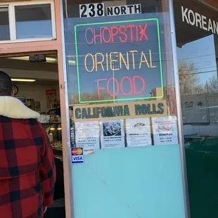 a man walking out of the door