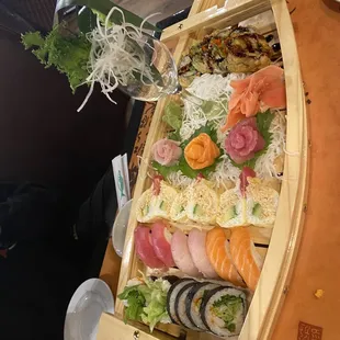 a sushi platter on a wooden table