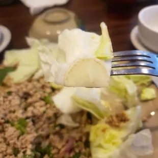 Larb comes with lettuce. Its a lettuce wrap and this is ridiculous