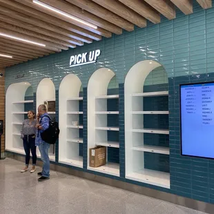 Pick Up Shelf with TV of names of where your order is