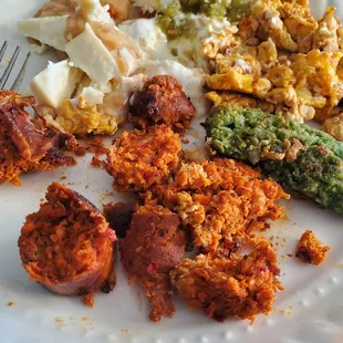 Spicy, mild, green and chicken chorizo. Made it with my beans and eggs with queso fresco this morning. Delicious!