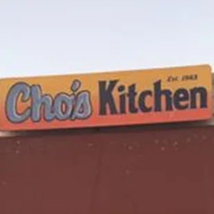 a sign on the roof of a restaurant