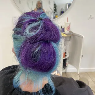 Vivid colors 
Teal and purple hair