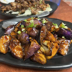 C12. Stir-Fry Eggplant and Minced Pork with garlic sauce.