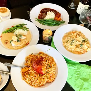 four plates of food on a table