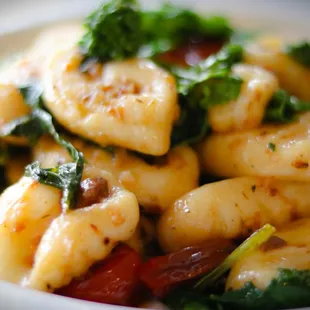 Goat Cheese Gnocchi, Broccoli Rabe, Oven Roasted  Grape Tomato, Garlic, EVOO, Chilies