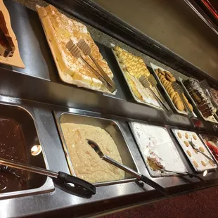 a variety of desserts in a buffet