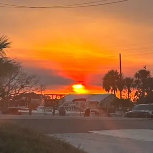 View of a beautiful sunset from the parking lot of Ted's