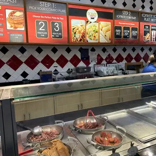 a buffet with a variety of food items