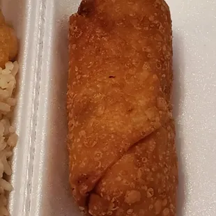 Egg roll that comes with the Happy Family Combination plate.