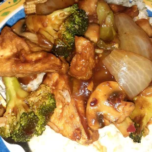Szechuan tofu with mixed vegetables over rice
