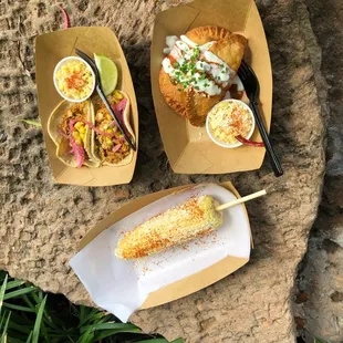pulled pork tacos, barbacoa empanadas, and elote