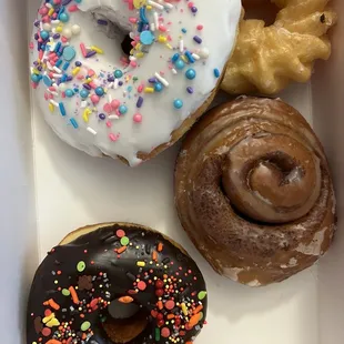 Our family favorites: sprinkle donuts for the kids, a French cruller for my husband, and a Pershing for me!