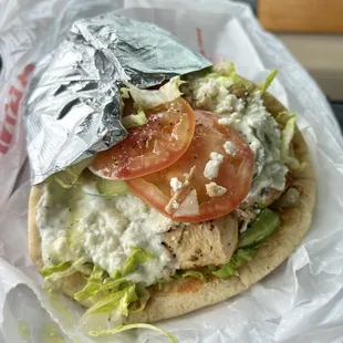 Athenian Delight (Chicken) Pita $13 (no onions) - awesome presentation. EXTREMELY dry flavorless chicken. Excellent sauce and feta.