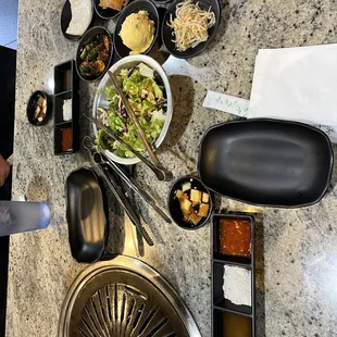 a table of food and utensils