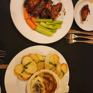 Smoked chicken wings and the shrimp and crab dip at Chris McD's