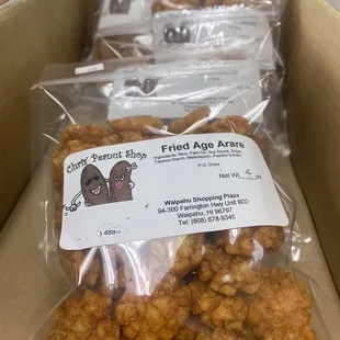a close up of a box of fried chicken