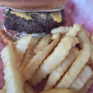 Rollie Burger with gooey Velveta cheese.