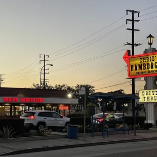cars parked in front of the restaurant
