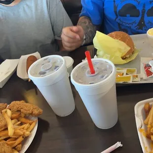 Corn dogs, double cheese burger, chicken strips and chili cheese fries. Sodas and chocolate shake.