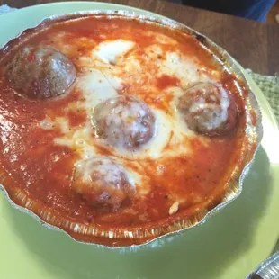 Baked manicotti with meatballs