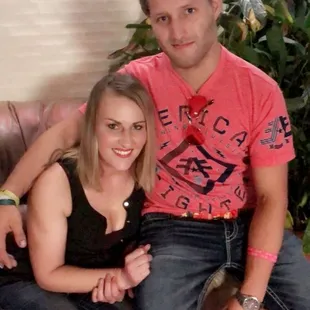a man and a woman sitting on a couch