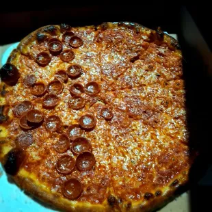 Half pepperoni and half cheese pie