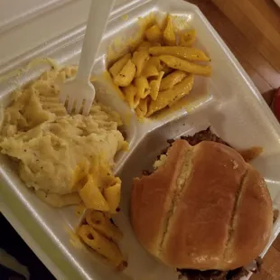 a sandwich and macaroni and cheese fries