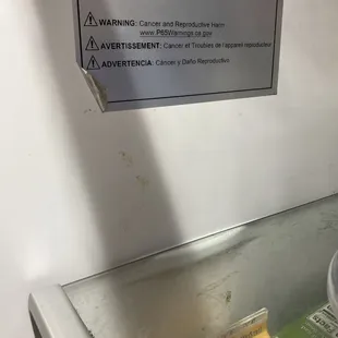This sticker was not visible when I inspected and purchased the floor model. They slapped it on after purchase and before delivery