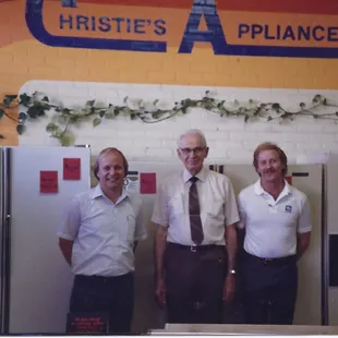 Current Owner (far left) with Charlie Christie (middle) and former business partner (far right)