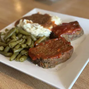 MEATLOAF DINNER with mashed potatoes, gravy, and green beans
