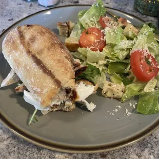 a sandwich and salad on a plate