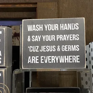 Tons of kitschy signs, with surprisingly funny quotes