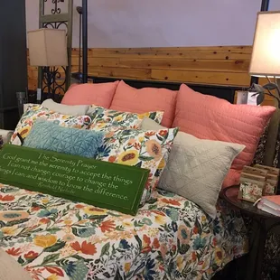 a bed with a sign on it