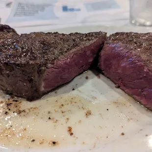 Strip steak - medium rare, cooked and seasoned to perfection