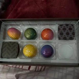 Left to right top row: Yuzu Mandarin, Rosemary, Passion Fruit, Earl Grey. Bottom row: Pistachio Cherry, Fresh Lemon, Lavender