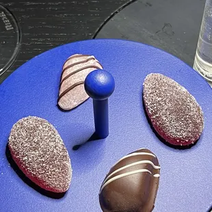 chocolates on a blue plate