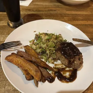 Meatloaf with Brussels sprouts and sweet potato wedges.