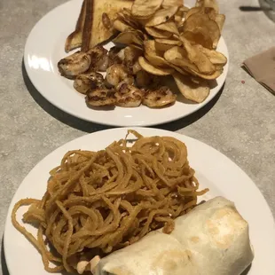 Cheeseburger Wrap with onion straws and grilled shrimp dinner with chips and toast