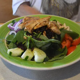 Apple Craisin Chicken on a bed of spinach