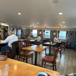 Simple and super clean medium sized dining room.